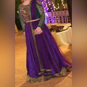 Purple and Green jewel-tone lengha choli with Beautiful embroidery and handwork